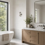 Carica l'immagine nella visualizzazione Galleria, Chrome wall sconce in a bright neutral interior