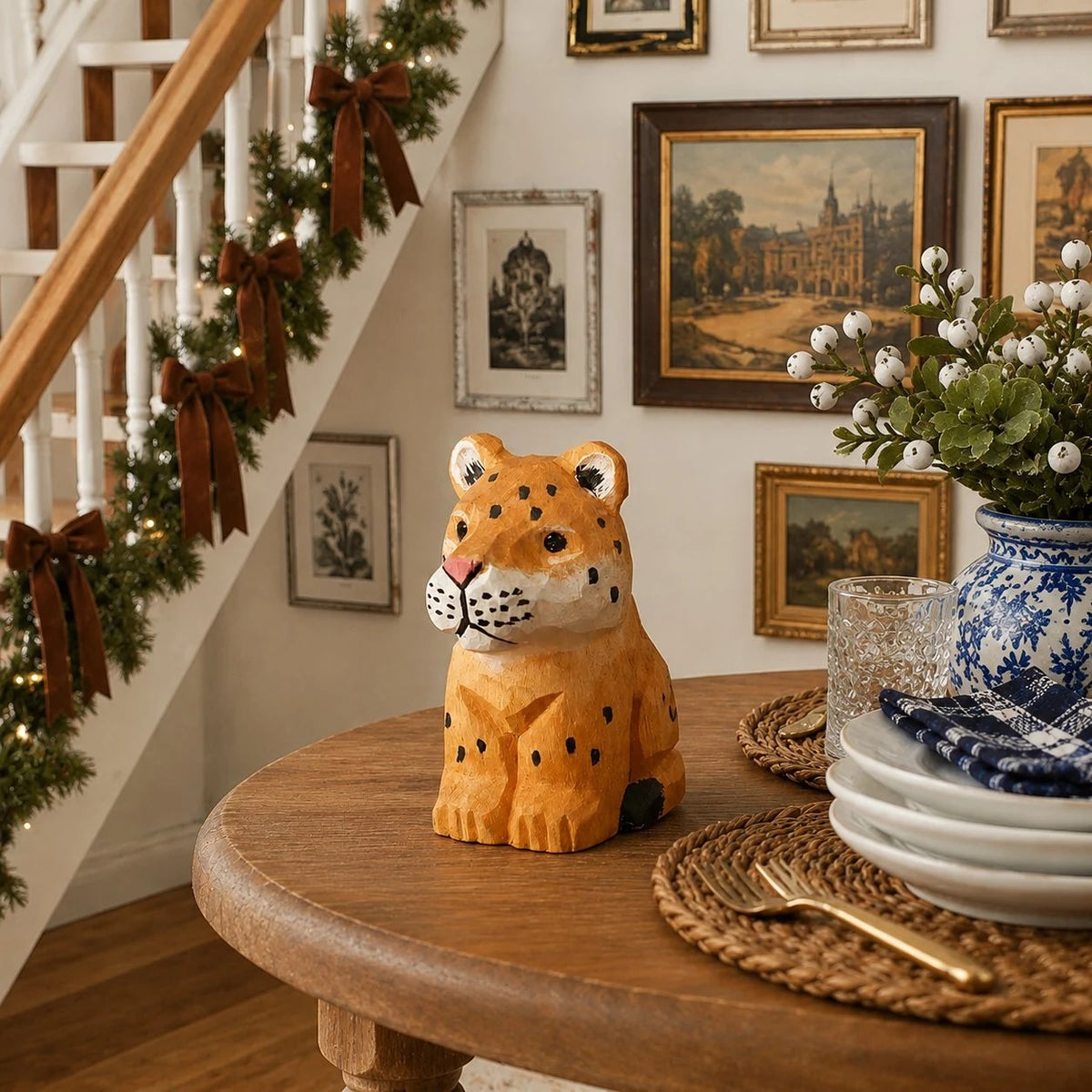 Wooden leopard figurine styled on a table
