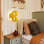Cargar imagen en el visor de la Galería, Yellow wall light beside a bed in a warm bedroom