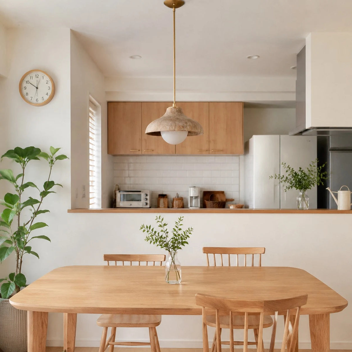 Pendant lamp over a warm wood dining table