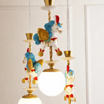 Cargar imagen en el visor de la Galería, Close up of blue unicorn ornament beside illuminated globe shade