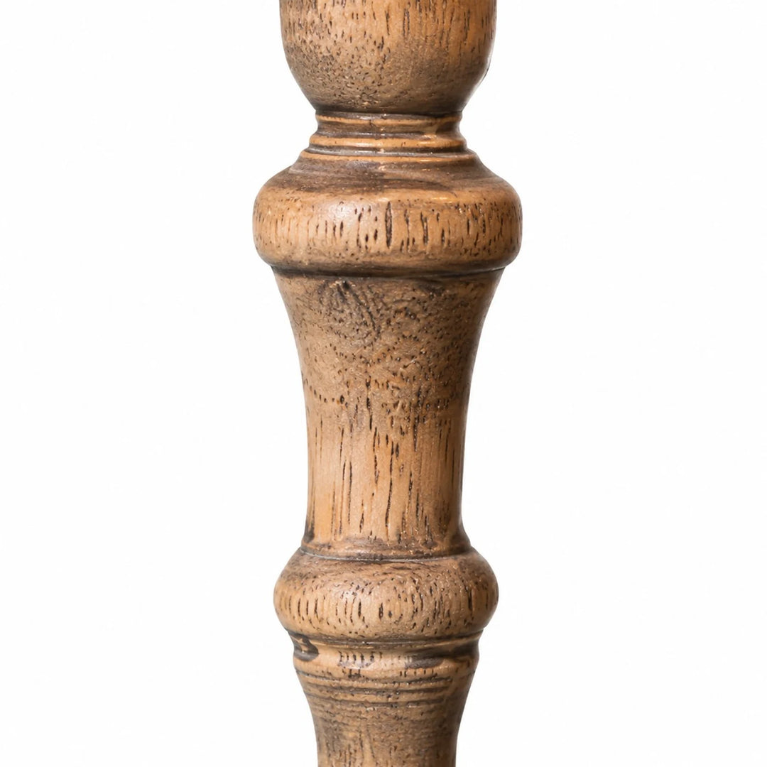Carved wooden lamp body detail