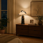 Afbeelding laden in galerijweergave, Botanical shade ceramic table lamp on a bedroom cabinet at night