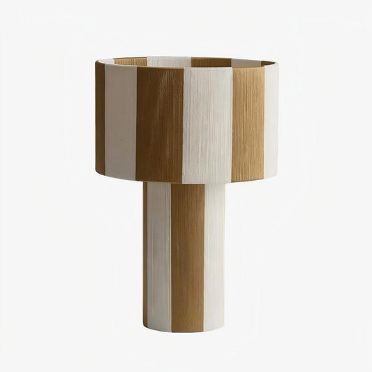 Apricot and white striped woven shade table lamp on a white background