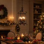 Afbeelding laden in galerijweergave, Black iron pendant creating a warm dining atmosphere