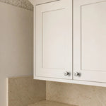 Bild in die Galerieansicht laden, Titanium silver knobs on white cabinet doors