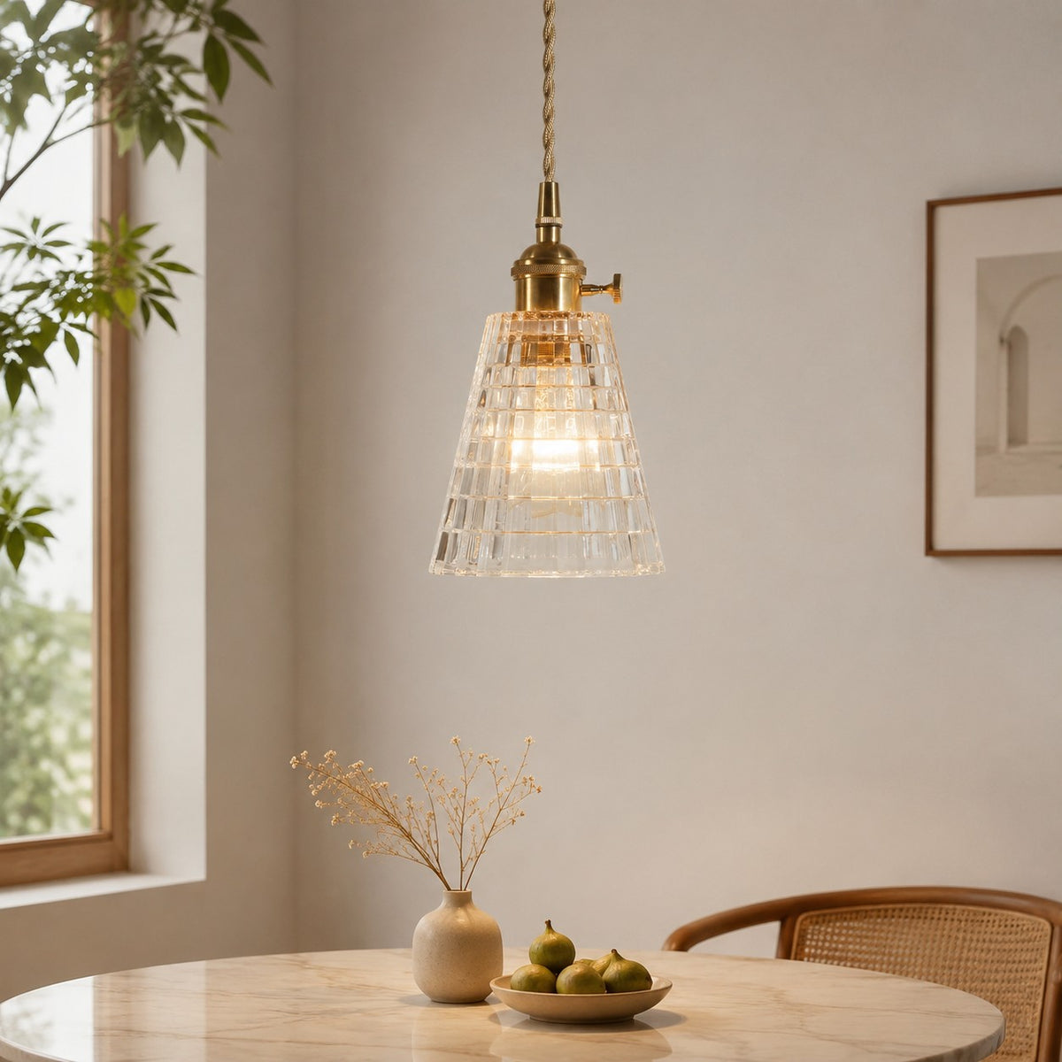 Style E geometric glass pendant above a wooden dining table