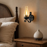 Afbeelding laden in galerijweergave, Industrial kerosene style wall lamp mounted beside a bed