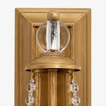 Cargar imagen en el visor de la Galería, Close view of carved brass backplate and crystal ornament
