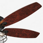 Carica l'immagine nella visualizzazione Galleria, Close view of wood tone fan blades and cage light
