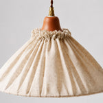 Load image into Gallery viewer, Close-up of gathered pleats around the natural linen pendant shade