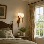 Load image into Gallery viewer, Vintage double wall sconce beside a bedroom window