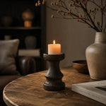 Afbeelding laden in galerijweergave, Solid wood candle holder in a dark neutral tabletop scene; candle not included