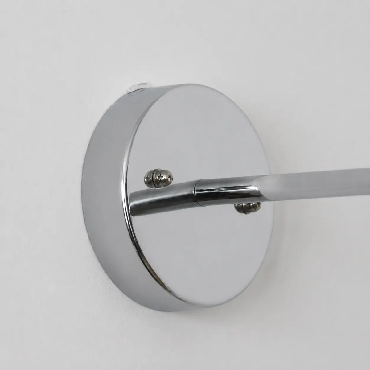 Wall plate and arm connection detail