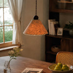 Cargar imagen en el visor de la Galería, Warm natural paper pendant lamp beside a window
