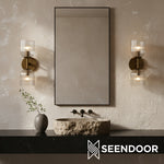 Load image into Gallery viewer, Bravira Ribbed Glass Sconce - Metal Wall Light with Clear Glass Shade
