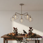 Load image into Gallery viewer, Selvion Curved-Arm Globe – Modern Chandelier for Dining &amp; Living
