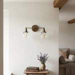 Load image into Gallery viewer, Lumio Globe Glass Globe Vanity Light - Modern Two Light Bathroom Sconce
