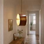 Cargar imagen en el visor de la Galería, Hand-laced leather cylinder pendant light in an interior setting