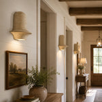 Charger l'image dans la visionneuse de la galerie, Travertine wall sconces installed along a warm hallway with wood beams