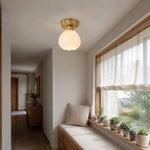 Bild in die Galerieansicht laden, Milk glass flower ceiling light above a window seat