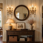 Carica l'immagine nella visualizzazione Galleria, Two-light wall sconces framing a round mirror above an entry console