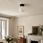Cargar imagen en el visor de la Galería, Minimalist glass ceiling lamp installed in a bright living room