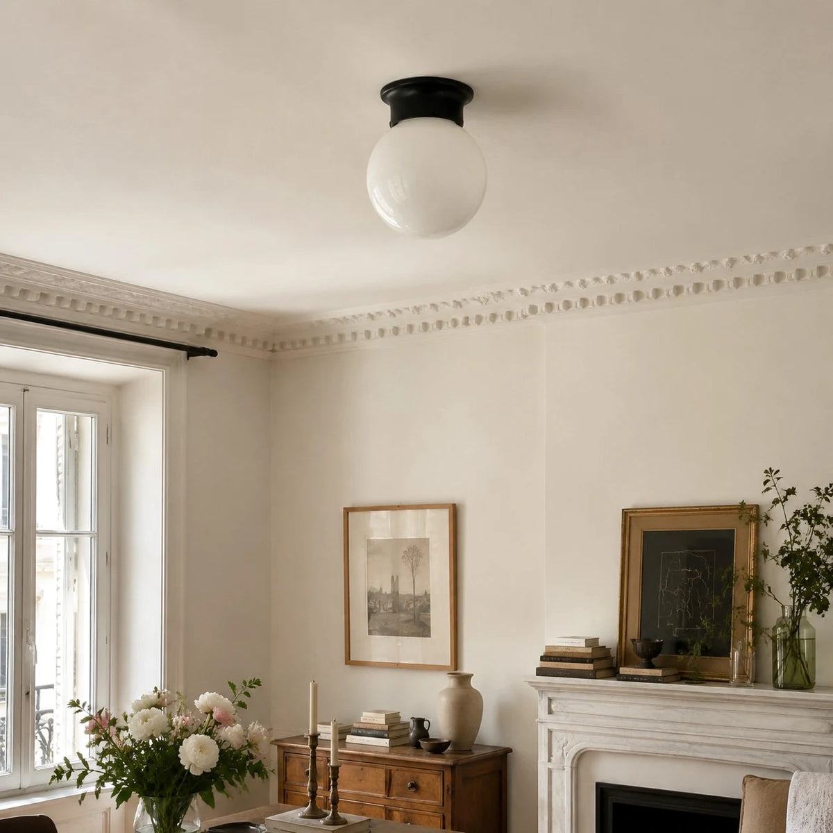 Minimalist glass ceiling lamp installed in a bright living room