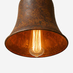 Cargar imagen en el visor de la Galería, Warm bulb glow below rust metal pendant shade