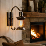 Cargar imagen en el visor de la Galería, Antique bronze wall lantern used as warm indoor wall accent