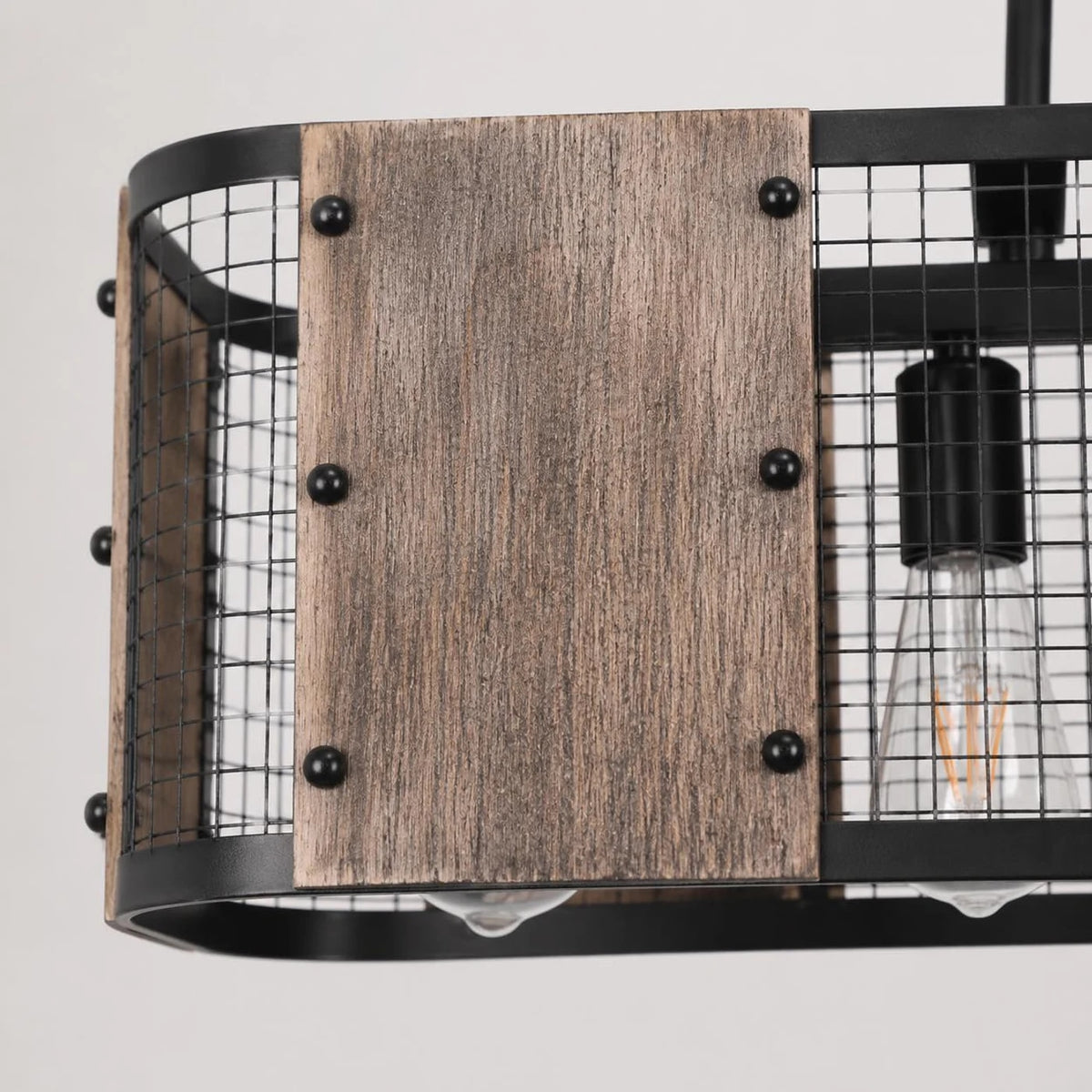 Close view of wood grain shade panel and black iron mesh