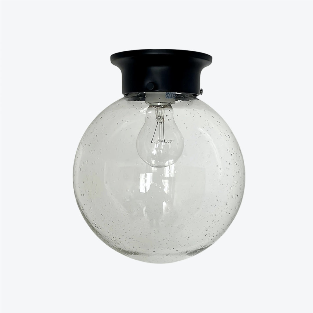 Minimalist Glass Ceiling and Black Metal Lamp