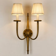 Front view of double arm wall sconce with pleated fabric shades