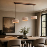 Charger l'image dans la visionneuse de la galerie, Three-light yellow travertine pendant installed above a long dining table