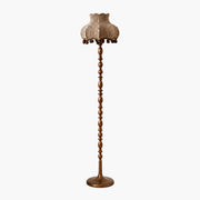 Full view of vintage floor lamp with brown vertical striped fabric shade