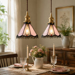 Cargar imagen en el visor de la Galería, Pair of pink stained glass pendants above a dining table