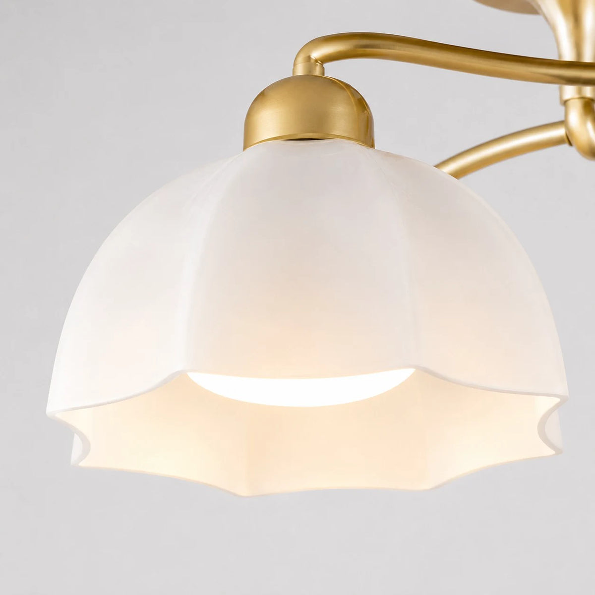 White flower-shaped glass shade detail