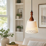 Carica l'immagine nella visualizzazione Galleria, cream ceramic cutout pendant light beside a window