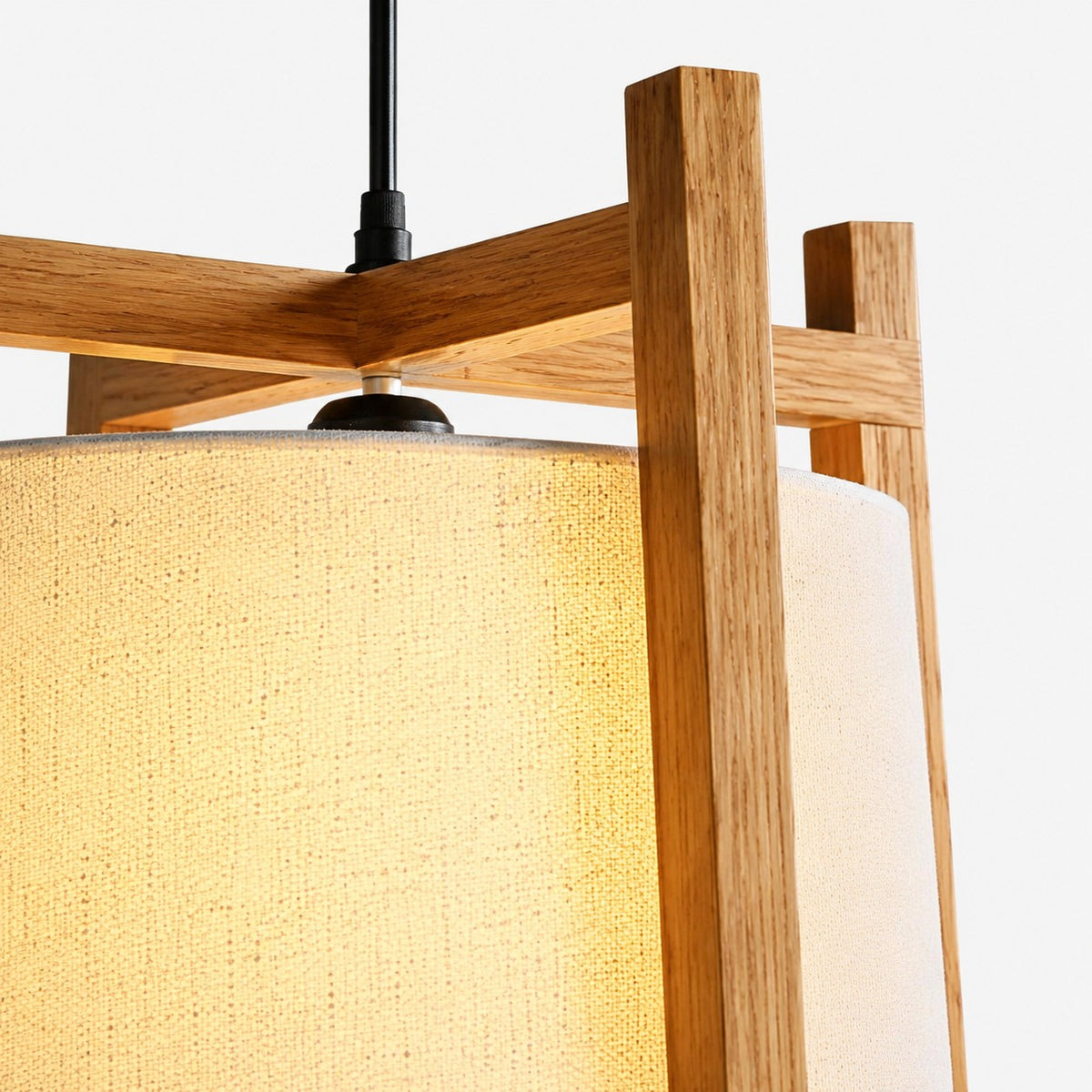Close-up of natural wood finish frame and fabric shade texture