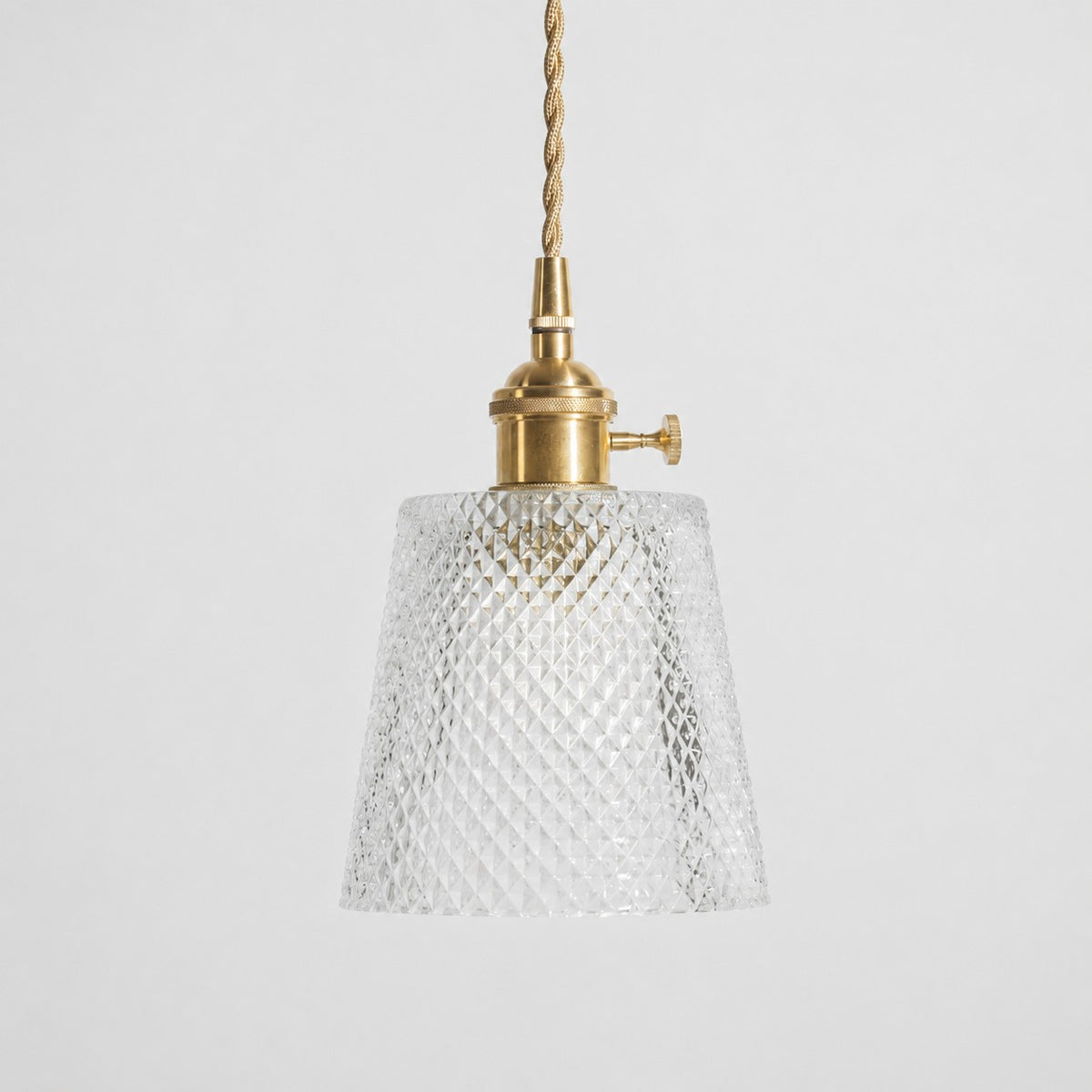 Style A textured glass shade with antique brass E27 socket, front view
