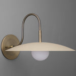 Load image into Gallery viewer, Curva Metal Modern Wall Sconce - Antique Brass Arm with Cream Disc Shade
