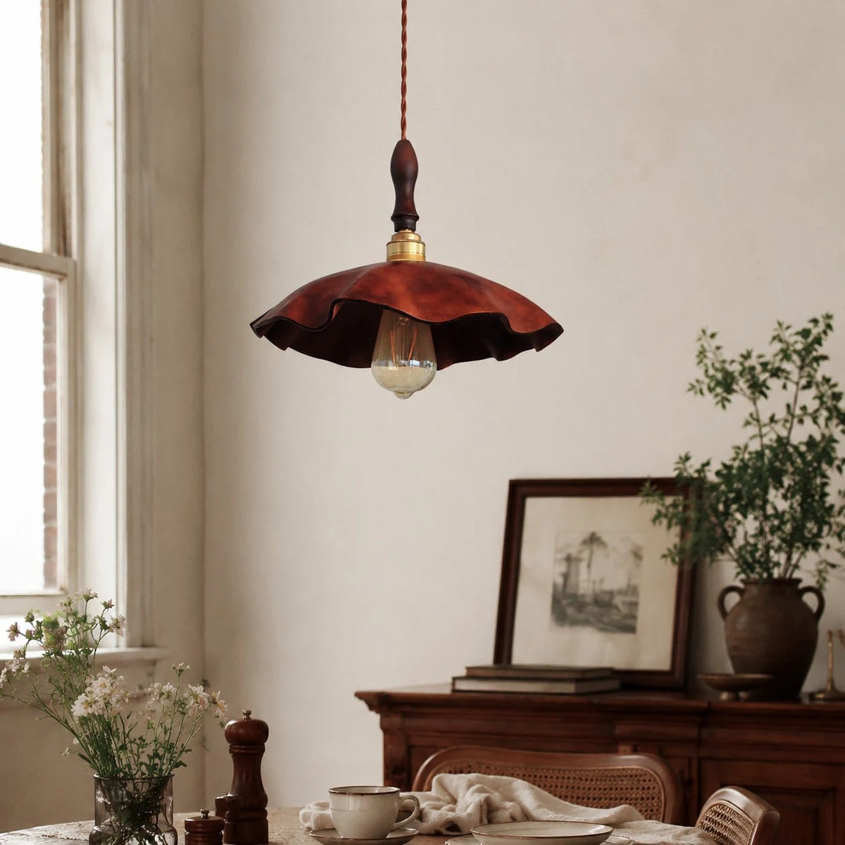 brown cowhide pendant light in a wabi sabi room setting