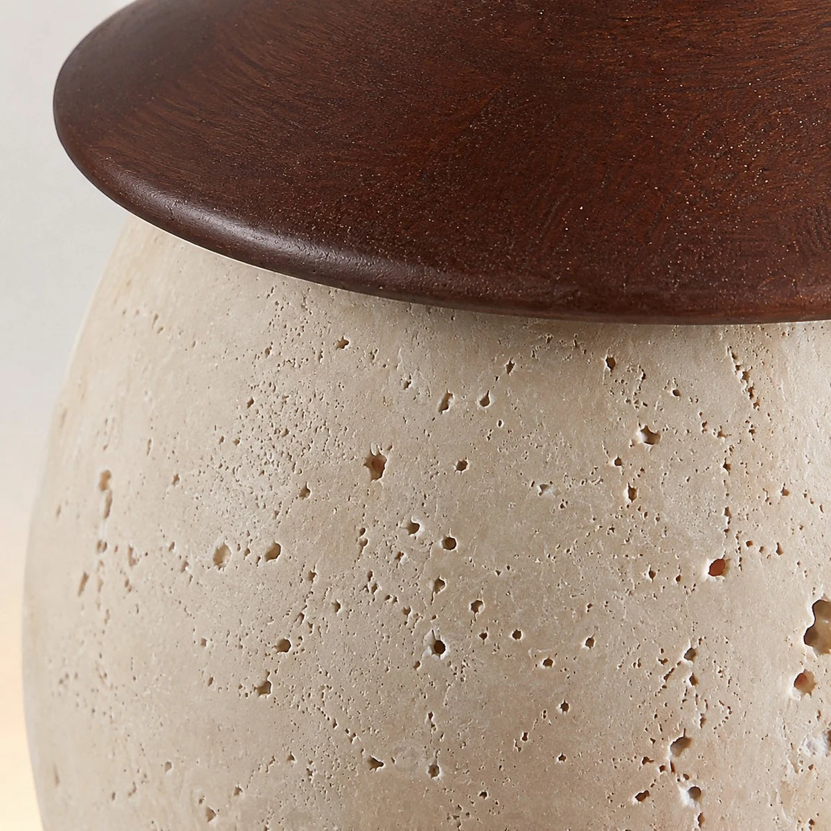 Stone texture and dark top fitting rim close-up