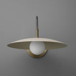 Load image into Gallery viewer, Curva Metal Modern Wall Sconce - Antique Brass Arm with Cream Disc Shade
