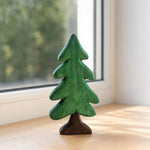 Bild in die Galerieansicht laden, Green wooden pine tree ornament beside a window