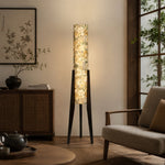 Carica l'immagine nella visualizzazione Galleria, Vintage ivory floral floor lamp glowing beside a lounge chair and wood cabinet