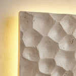 Cargar imagen en el visor de la Galería, Side depth and hand-finished stone profile of the travertine wall sconce