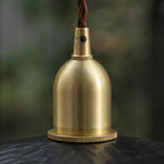 Charger l'image dans la visionneuse de la galerie, Brass tone holder detail on octagonal wood pendant light