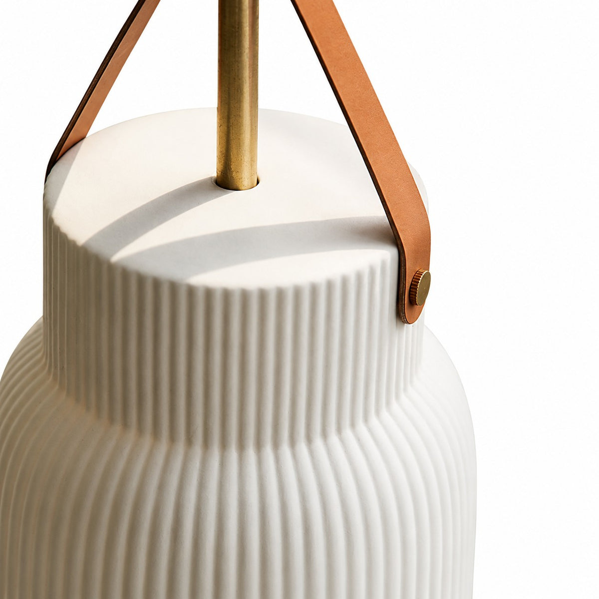 Brass finish and ceramic pendant detail