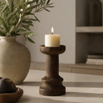 Afbeelding laden in galerijweergave, Solid wood candle holder in a calm sunlit tabletop setting; candle not included